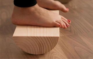 Tronco de madera suelo pelvico propioceptivo