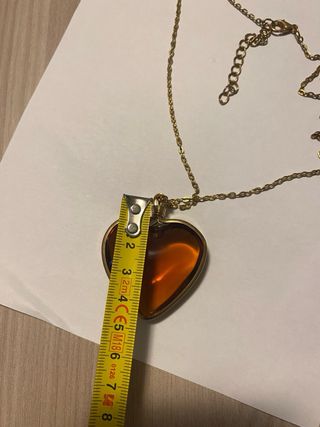 Ciondolo a forma di cuore ambra dorata