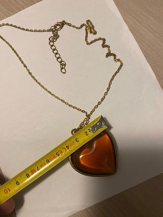 Ciondolo a forma di cuore ambra dorata