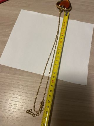 Ciondolo a forma di cuore ambra dorata