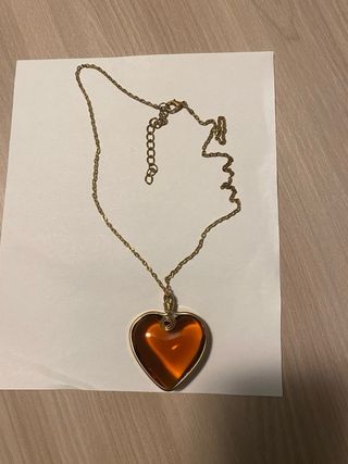 Ciondolo a forma di cuore ambra dorata