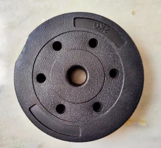 4 pesas de 2 kg cada una