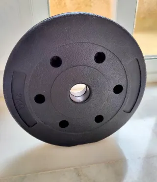 4 pesas de 2 kg cada una