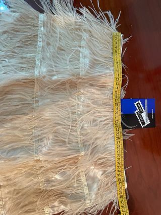 Minifalda plumas beige