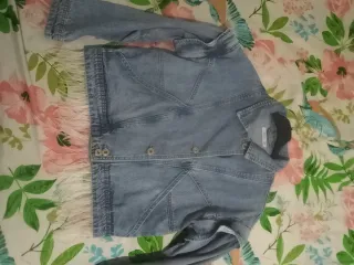 Chaqueta tejana con flecos