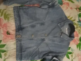 Chaqueta tejana con flecos