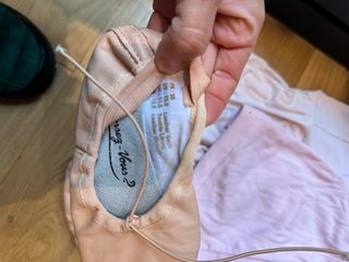 Ropa y zapatillas de ballet rosa