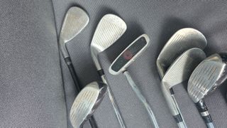 11 palos de golf variados