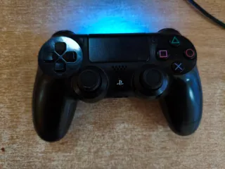 PS4 (PlayStation 4) Nera + 4 Giochi