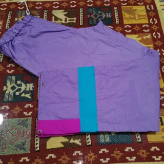 Conjunto impermeable Wild Peak morado y turquesa