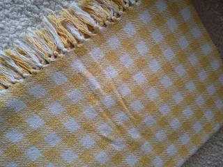 Mantita de sofa de la marca Muy Mucho