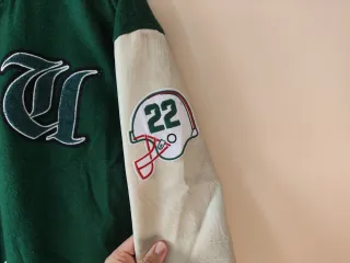 Chaqueta de fútbol americano verde