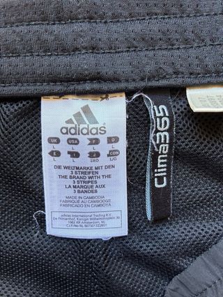 Pantalón chándal Adidas negro licra