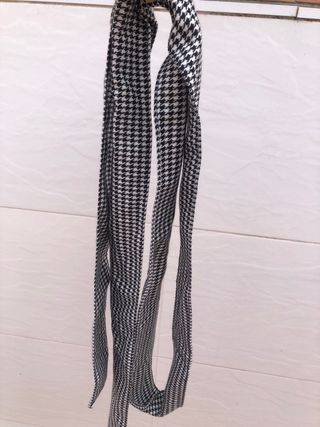 chaleco de cuadros con estampado por detrás