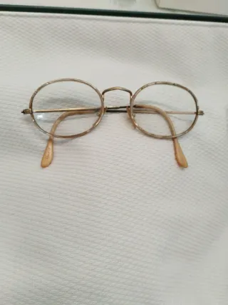 Gafas vintage redondas doradas