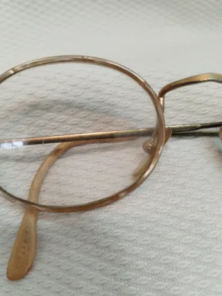 Gafas vintage redondas doradas