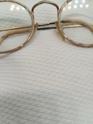 Gafas vintage redondas doradas