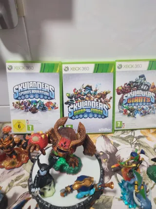 Xbox 360 con 9 juegos y 2 bases Skylanders y más