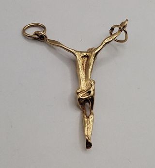 Crucifijo sin cruz de oro 18k, 1,75gr, Ref. O-331.