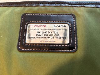 Maletín Knomo Negro Cuero, usado.