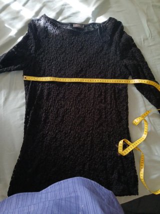 Blusa de encaje negro