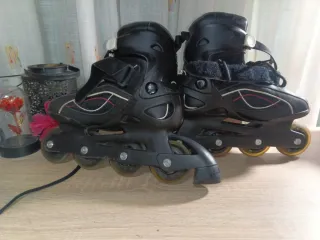 Patines Oxelo negros con detalles rosas