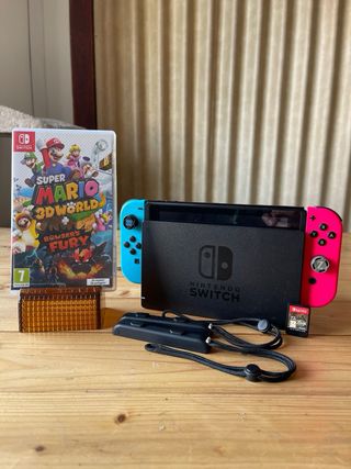 Nintendo Switch Blu/Rosa con Zelda+Mario 3D World