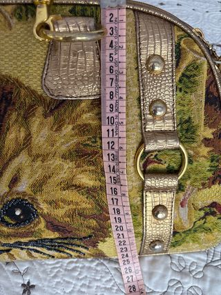 Bolso de mano en tapicería