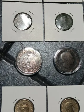 Lotto 12 monete romane e spagnole.