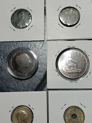 Lotto 12 monete romane e spagnole.