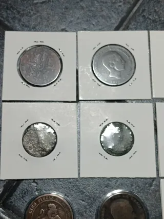 Lotto 12 monete romane e spagnole.