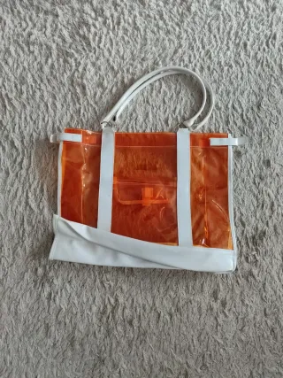 Bolso transparente naranja y blanco