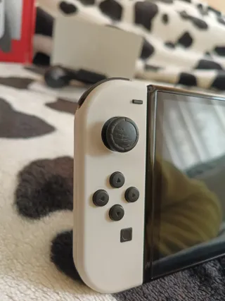 Pacchetto Nintendo Switch OLED Bianca e Nera