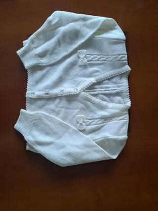 Conjunto chaqueta y falda punto niña