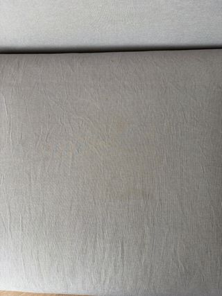 Sofá individual gris claro