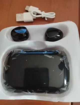 Auriculares Bluetooth Negros y carga movil