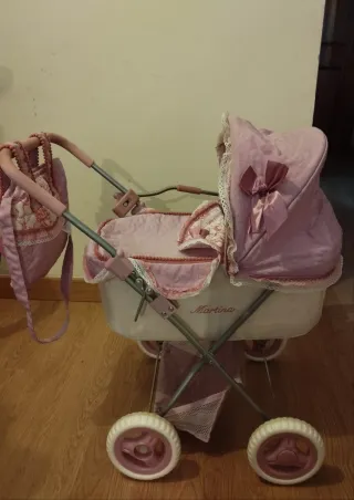 Carrito de muñecas rosa Martina
