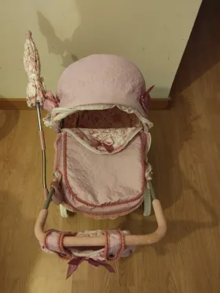 Carrito de muñecas rosa Martina