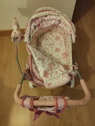 Carrito de muñecas rosa Martina