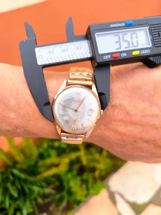 Reloj suizo Cauny Calendar Antiguo.