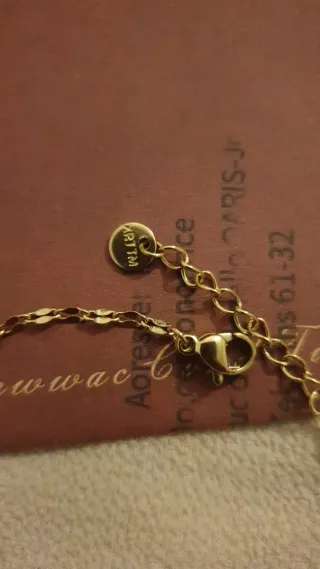 Pulsera dorada con circonita cuadrada