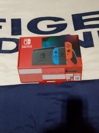 Nintendo Switch OLED Blu e Arancione