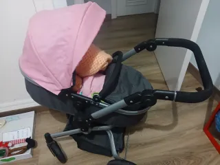 Carrito de muñecas rosa y gris dos plantas
