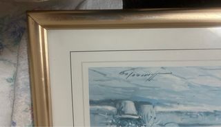 Cuadro azul y dorado con marco metálico