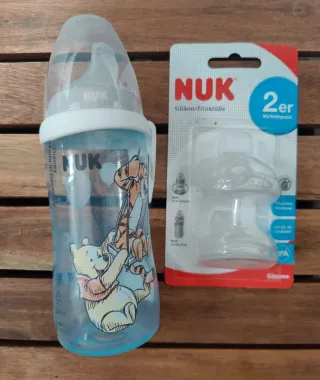 Biberón NUK Winnie Pooh + 2 boquillas