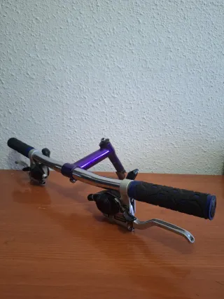 Manillar y potencia MTB morado