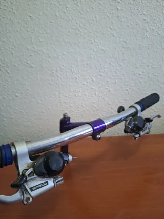 Manillar y potencia MTB morado