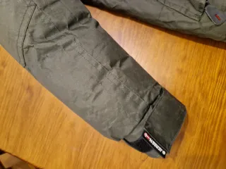 Abrigo Geographical Norway verde.Talla 14 años