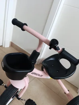 Triciclo rosa poco uso