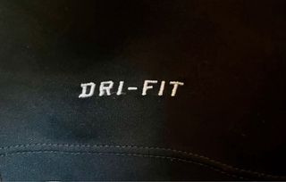 Camiseta Nike Dri-Fit Gris y Naranja